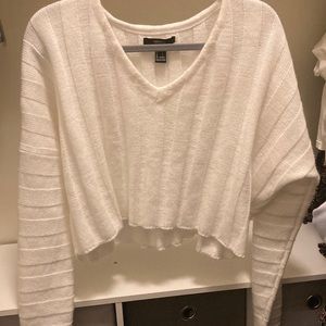 White long sleeved slightly cropped sweater